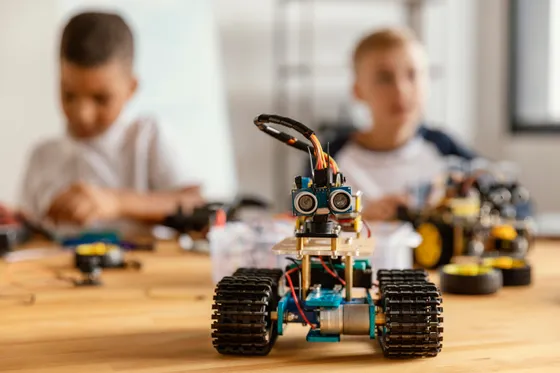 Children building a robot